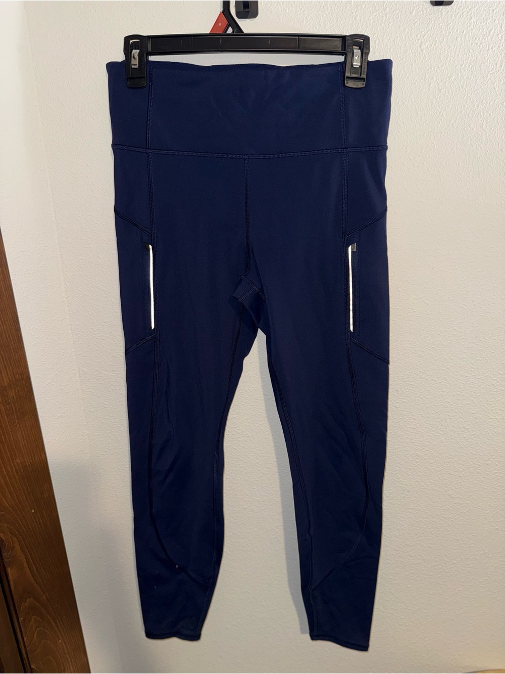 Athleta Navy High-Rise Leggings with Reflective Zip Pockets